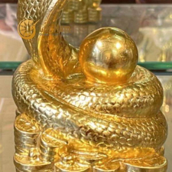 Tượng rắn tiền bằng đồng dát vàng 24k